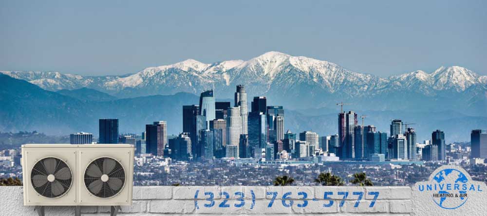 los angeles skyline with snow capped peaks